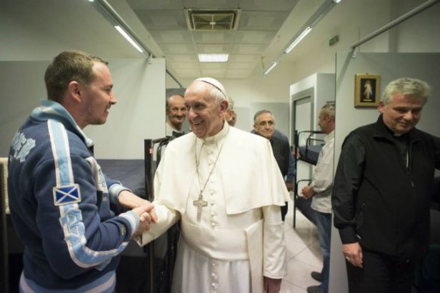 Pope Francis makes a visit to Rome's new dorms for homeless men on Oct. 15, 2015.