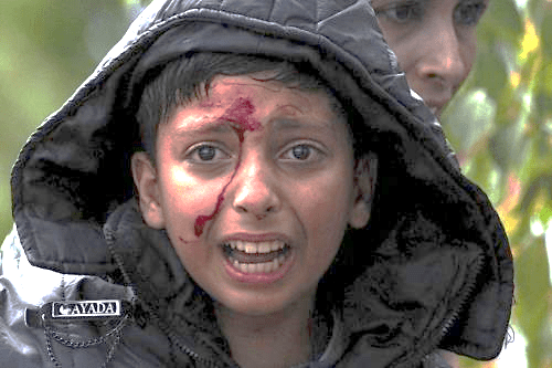 Bambini migranti, la paura nei volti