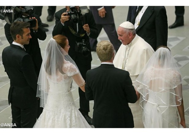 Pope Francis greets newly married couples during his General Audience in the Paul VI Hall - ANSA