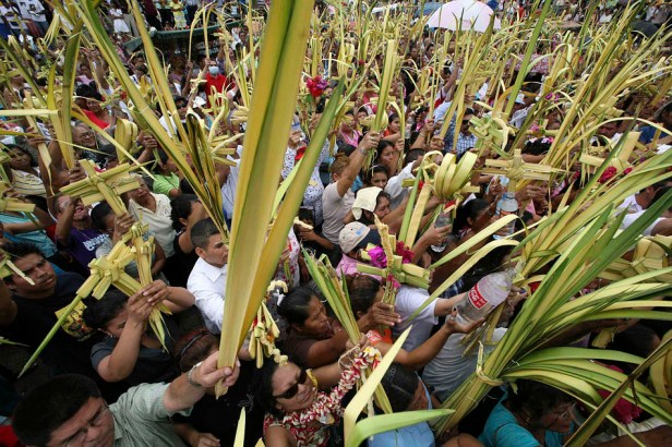 Parishioners pray during a mass in the Metropolitan Cathedral in Managua