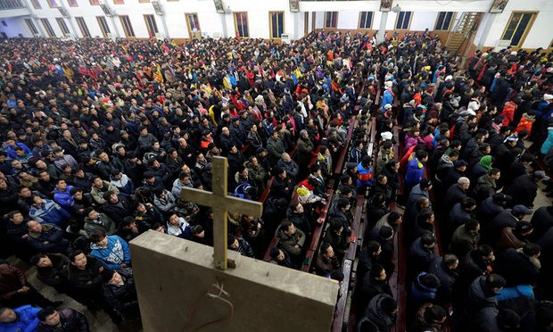 Churchgoers attend mass near the city of Taiyuan, Shanxi province. Christian groups have criticised authorities after reports of a plan to ban religious worship near the G20 summit.