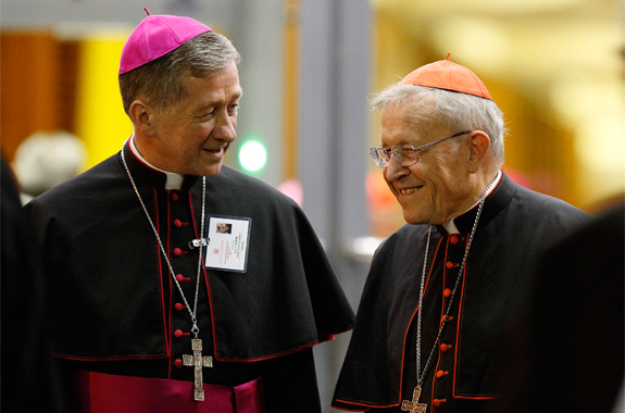 Archbishop Blase J. Cupich of Chicago talks with German Cardinal Walter Kasper