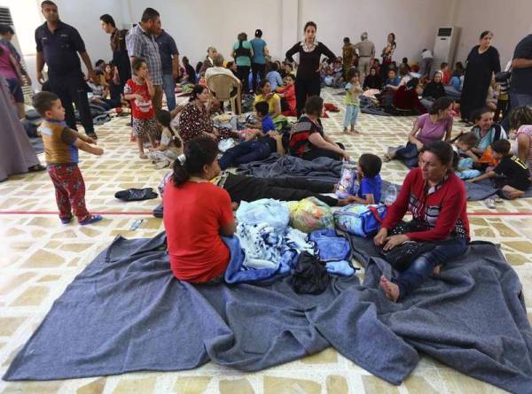 Irak -Reuters- Mosul, familias cristianas que dejaron sus casas