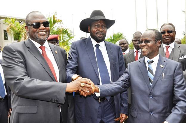 First Vice President of South Sudan Riek Machar, President Salva Kiir and Second Vice President of James Wani Igga after the formation of the new cabinet of the Transitional Government in Juba on April 29, 2016.